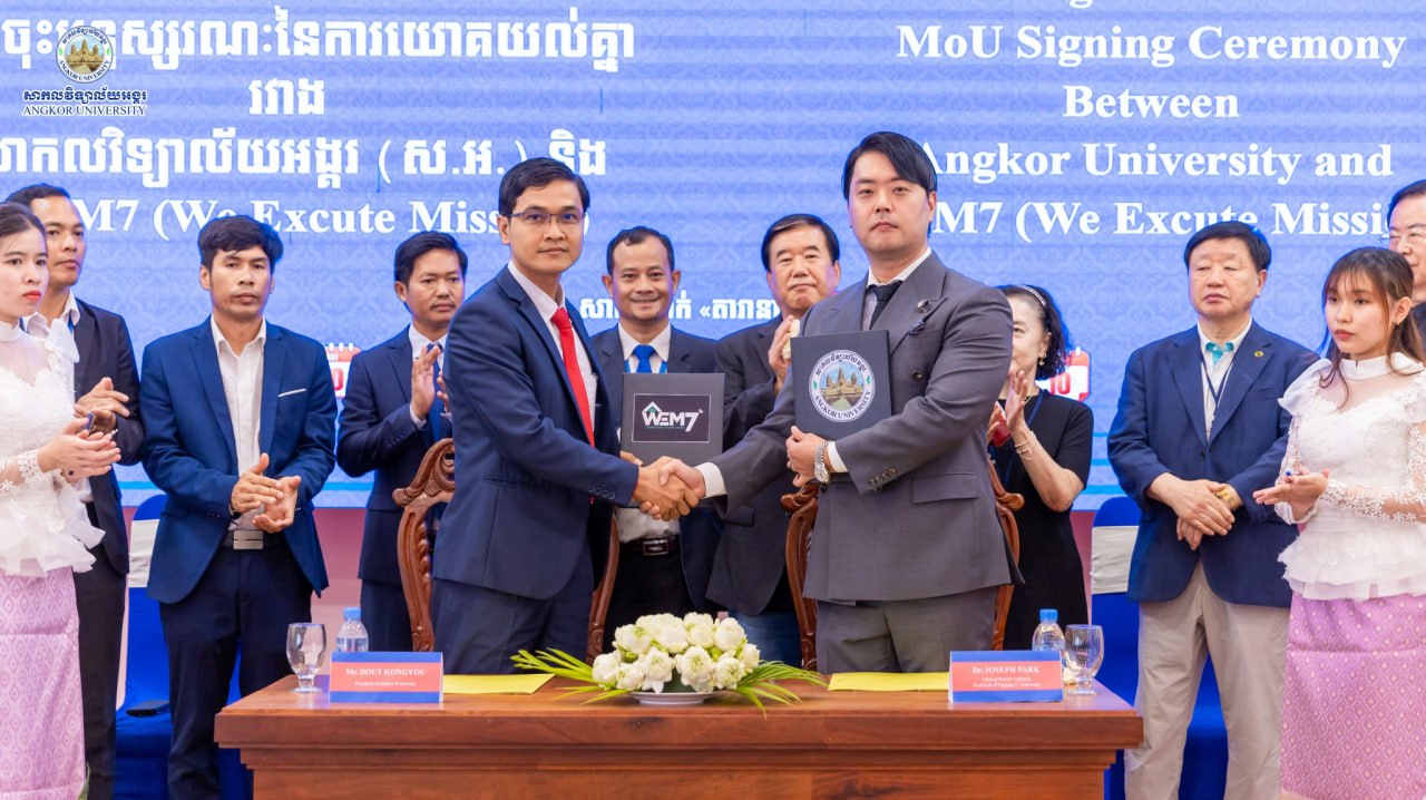 The MOU signing ceremony between Angkor University and the WEM7 (We Excute Mission)